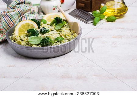 Traditional Pasta Tripoline With Pesto And Broccoli In A Plate On The Table. Selective Focus.