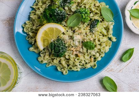 Traditional Pasta Tripoline With Pesto And Broccoli In A Plate On The Table. Selective Focus.