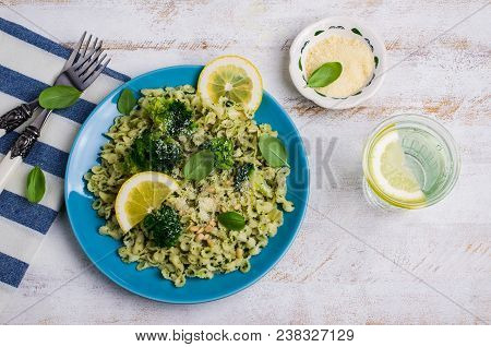 Traditional Pasta Tripoline With Pesto And Broccoli In A Plate On The Table. Selective Focus.