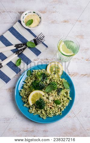 Traditional Pasta Tripoline With Pesto And Broccoli In A Plate On The Table. Selective Focus.