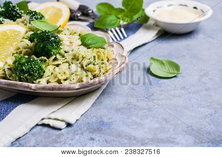 Traditional Pasta Tripoline With Pesto And Broccoli In A Plate On The Table. Selective Focus.