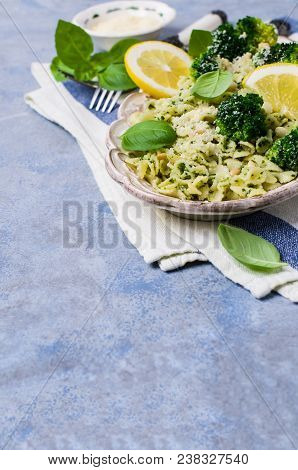 Traditional Pasta Tripoline With Pesto And Broccoli In A Plate On The Table. Selective Focus.