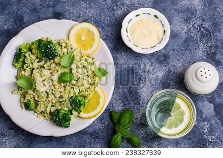 Traditional Pasta Tripoline With Pesto And Broccoli In A Plate On The Table. Selective Focus.