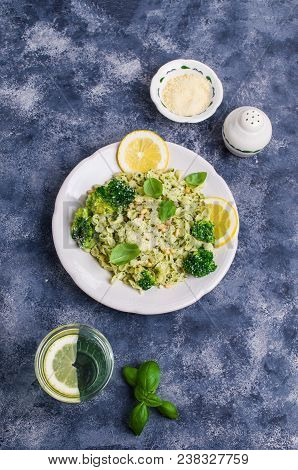 Traditional Pasta Tripoline With Pesto And Broccoli In A Plate On The Table. Selective Focus.
