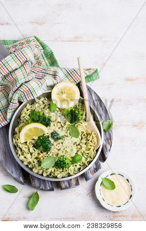Traditional Pasta Tripoline With Pesto And Broccoli In A Plate On The Table. Selective Focus.