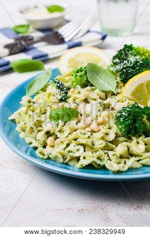 Traditional Pasta Tripoline With Pesto And Broccoli In A Plate On The Table. Selective Focus.