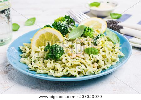Traditional Pasta Tripoline With Pesto And Broccoli In A Plate On The Table. Selective Focus.