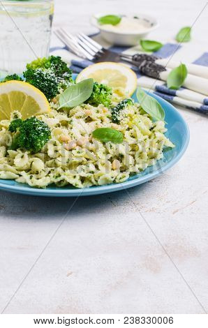 Traditional Pasta Tripoline With Pesto And Broccoli In A Plate On The Table. Selective Focus.