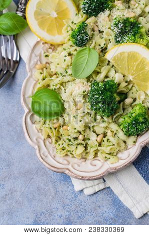 Traditional Pasta Tripoline With Pesto And Broccoli In A Plate On The Table. Selective Focus.