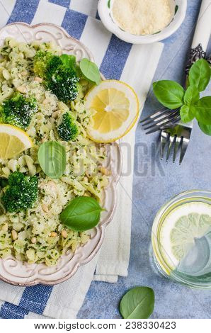 Traditional Pasta Tripoline With Pesto And Broccoli In A Plate On The Table. Selective Focus.