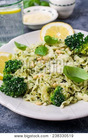 Traditional Pasta Tripoline With Pesto And Broccoli In A Plate On The Table. Selective Focus.
