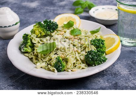 Traditional Pasta Tripoline With Pesto And Broccoli In A Plate On The Table. Selective Focus.
