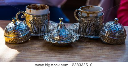 Beautiful Silver Design Cups And Bowl For The Turkish Coffee On The Table