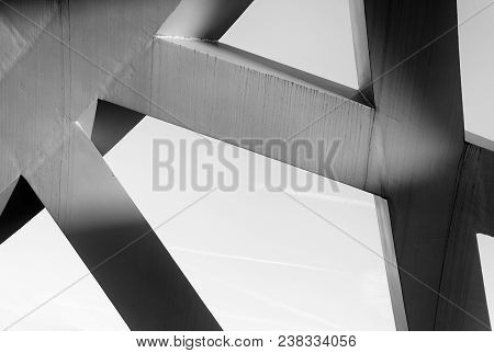 Abstract Box Steel Structure Combining Strong Metal Elements To Form A Large Asymmetrical Lattice.