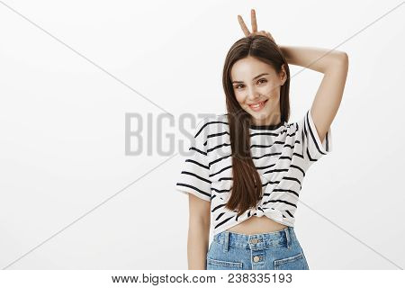 Girl Wanting To Show Boyfriend She Is In Playful Mood. Charming Feminine European Woman With Brown H
