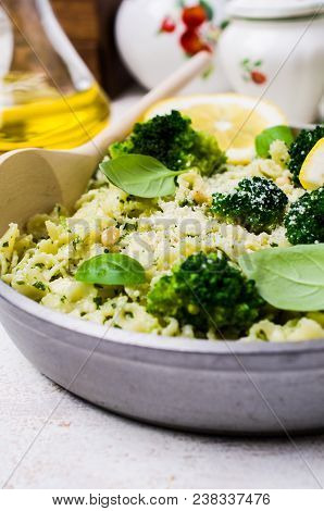 Traditional Pasta Tripoline With Pesto And Broccoli In A Plate On The Table. Selective Focus.
