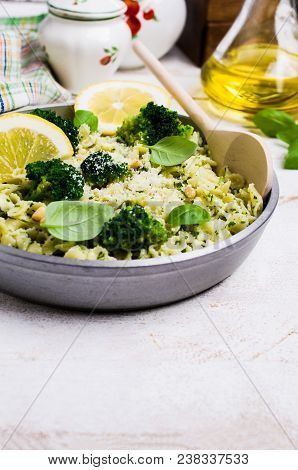 Traditional Pasta Tripoline With Pesto And Broccoli In A Plate On The Table. Selective Focus.
