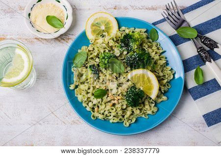 Traditional Pasta Tripoline With Pesto And Broccoli In A Plate On The Table. Selective Focus.