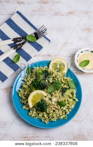 Traditional Pasta Tripoline With Pesto And Broccoli In A Plate On The Table. Selective Focus.