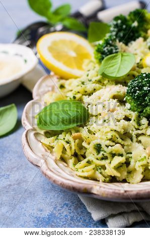 Traditional Pasta Tripoline With Pesto And Broccoli In A Plate On The Table. Selective Focus.