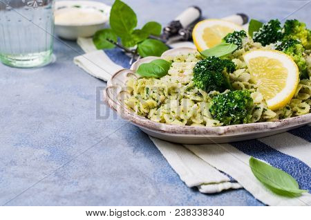 Traditional Pasta Tripoline With Pesto And Broccoli In A Plate On The Table. Selective Focus.