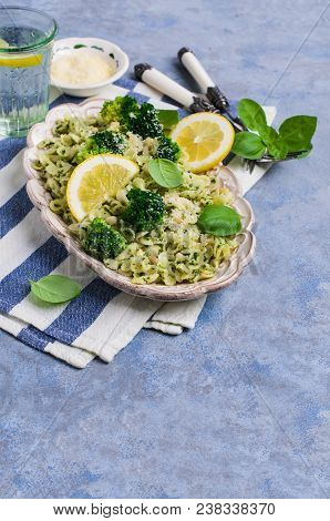 Traditional Pasta Tripoline With Pesto And Broccoli In A Plate On The Table. Selective Focus.
