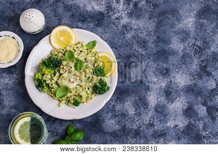 Traditional Pasta Tripoline With Pesto And Broccoli In A Plate On The Table. Selective Focus.