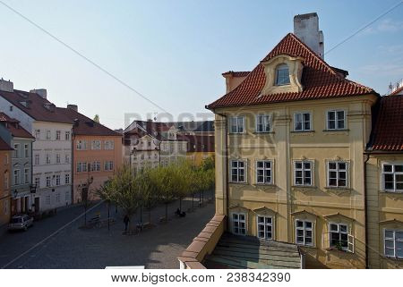 Yellow House With A Tiled Roof On The Boulevard. Prague.