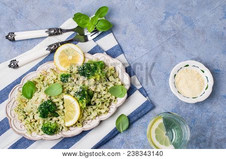 Traditional Pasta Tripoline With Pesto And Broccoli In A Plate On The Table. Selective Focus.
