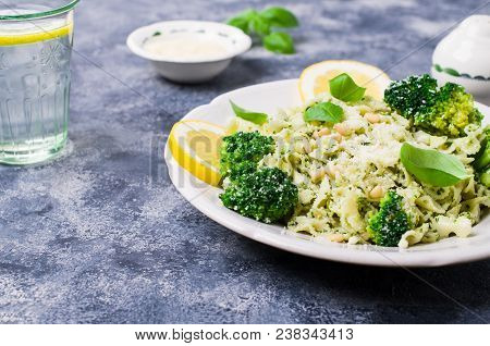 Traditional Pasta Tripoline With Pesto And Broccoli In A Plate On The Table. Selective Focus.