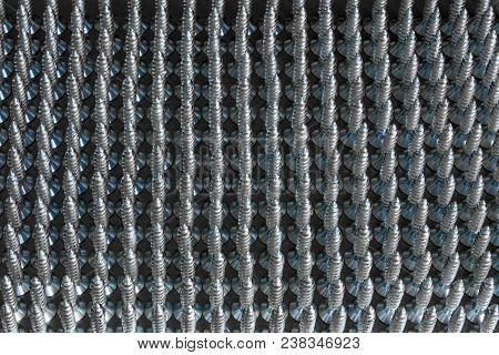 Steel Self-taping Screws. Screws Stand In Straight Rows.
