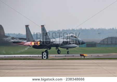 Raf Lakenheath, Uk - April 13, 2018: American Jet F-15 Take Off From Raf Lakenheath Base In A Grey F