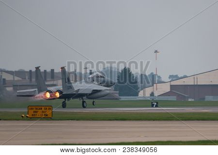 Raf Lakenheath, Uk - April 13, 2018: American Jet F-15 Take Off From Raf Lakenheath Base In A Grey F