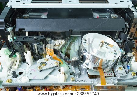 Vhs Videocassette Is Put Into The Video Recorder To Watch The Video, Another Video Cassette Is On Th