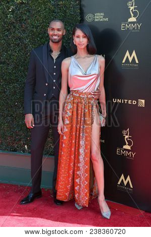 LOS ANGELES - APR 27:  Lamon Archey, fiance at the 2018 Daytime Emmy Awards - Creative at Pasadena Civic Auditorium on April 27, 2018 in Pasadena, CA