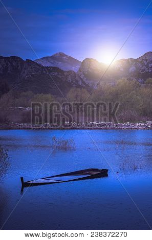 Old Sunken Wooden Fisherman Boat On The Shore Of Lake Skadar In Virpazar, Montenegro