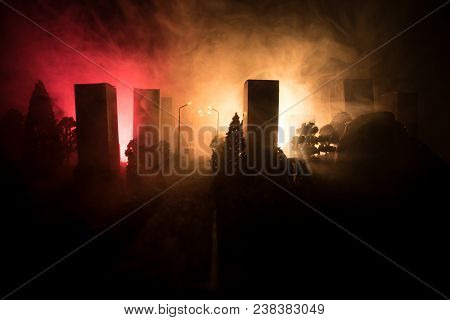 Empty Street Of Burnt Up City, Flames On The Ground And Blasts With Smoke In The Distance. Apocalypt