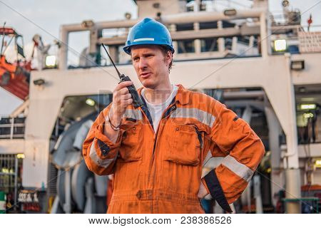 Marine Deck Officer Or Chief Mate On Deck Of Offshore Vessel Or Ship , Wearing Ppe Personal Protecti