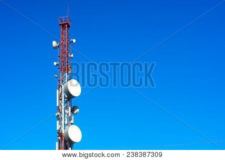 High Telephone Tower. Beautiful Sky With A Communications Tower In The Foreground