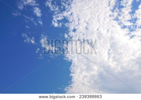 Beautiful Nature Blue Sky With Clouds, Sky Clouds Background, Cloudscape Concept. Space For Text In 