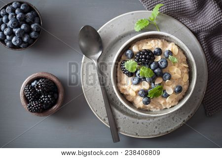healthy breakfast steel cut oatmeal porridge with blueberry blackberry