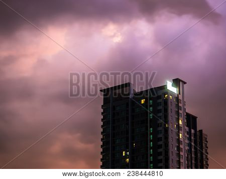 Building In Front Of A Cloudy Sky
