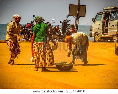 Unknown Woman Cleaning The Street Of Palolem In Goa India October 25-2017 On The Morning