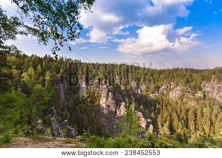 Bastei Rocks In Swiss Saxony, Around The Ruins Of Neurathen Castle. Germany In Summer