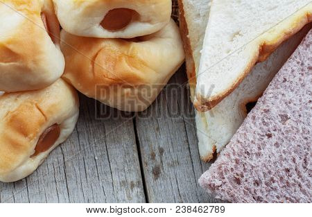 Toasted Bread And Waffle On Wood Floor.