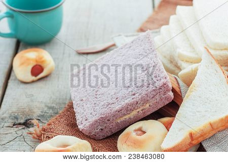 Cream Bread And Ham On A Sackcloth.