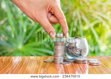 Hand Putting Money Coin Stack Growing Business, Money Saving Ideas