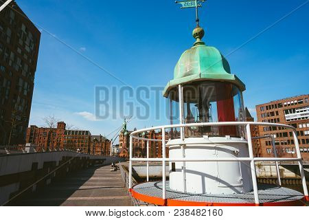 Old Beacon Or Small Lighthouse In Hamburg Hafencity.