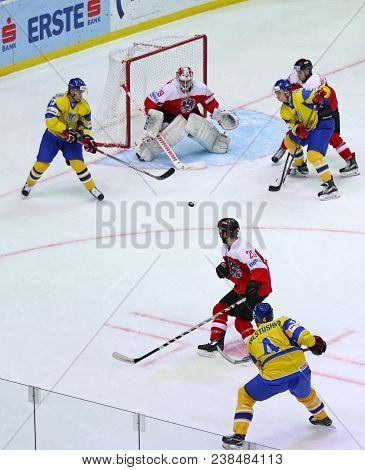 Kyiv, Ukraine - April 25, 2017: Ukrainian Ice-hockey Players (yellow Jersey) Fight For A Puck With A