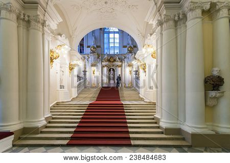Saint Petersburg, Russia - March 16, 2018: Tourists On Main Stair Of Great Hermitage Museum. The Sta